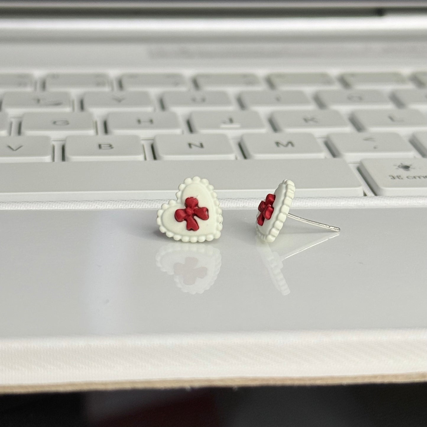 Red Bow in White Heart