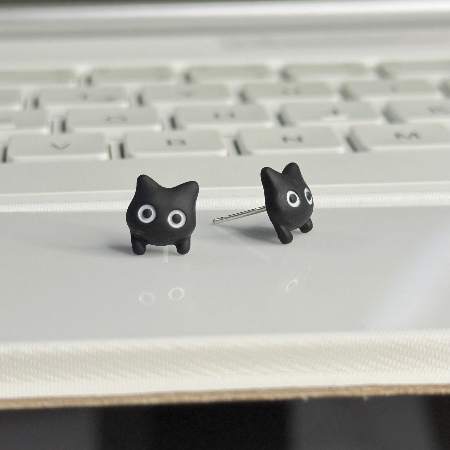 Black cat ear studs