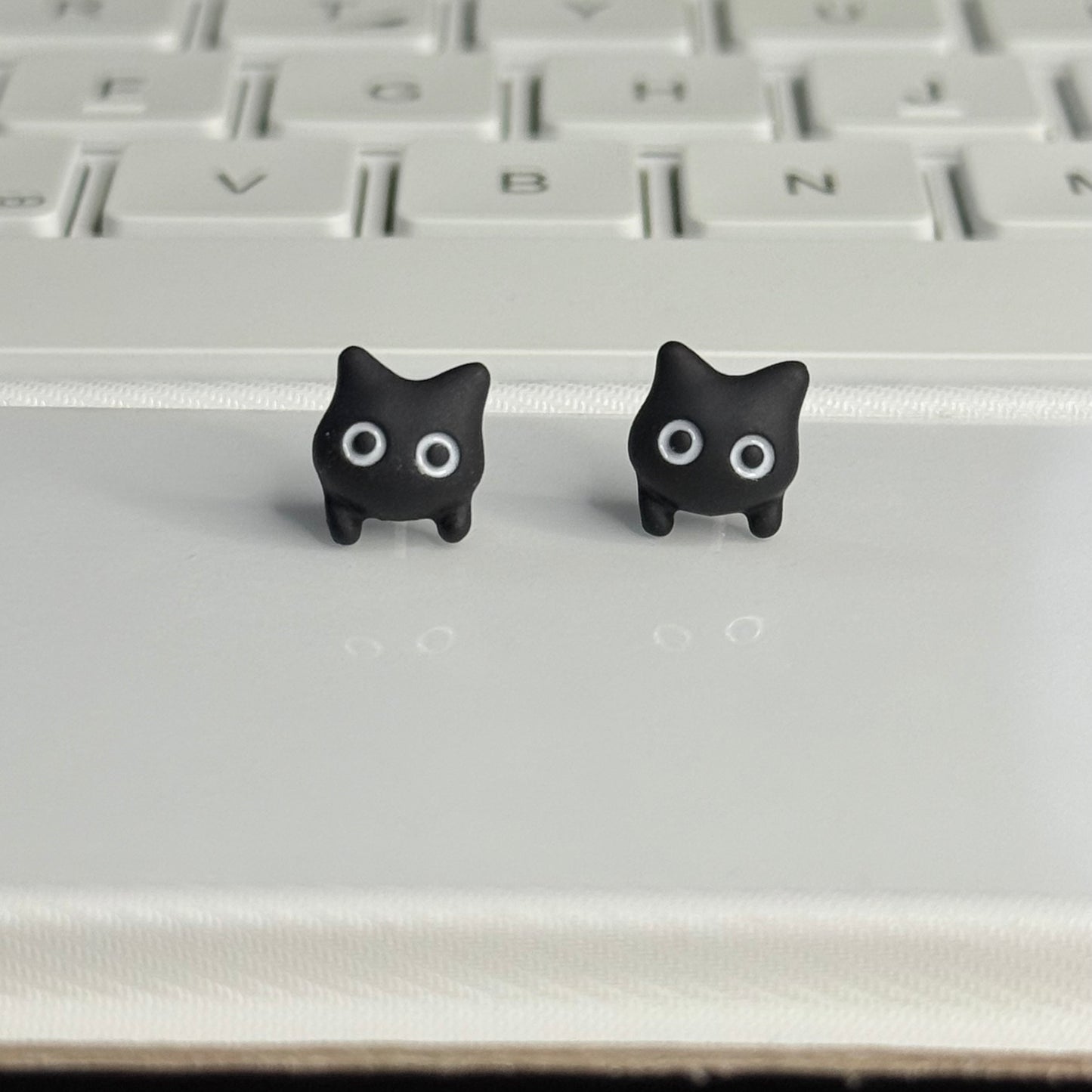 Black cat ear studs