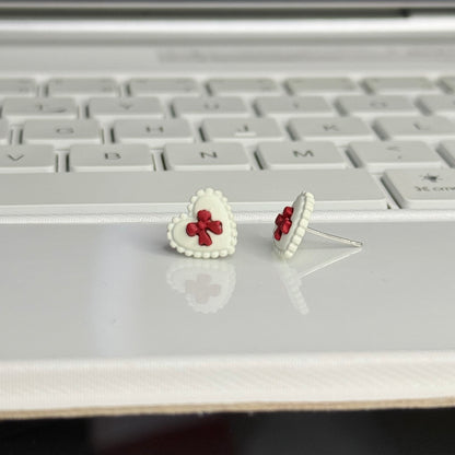Red Bow in White Heart